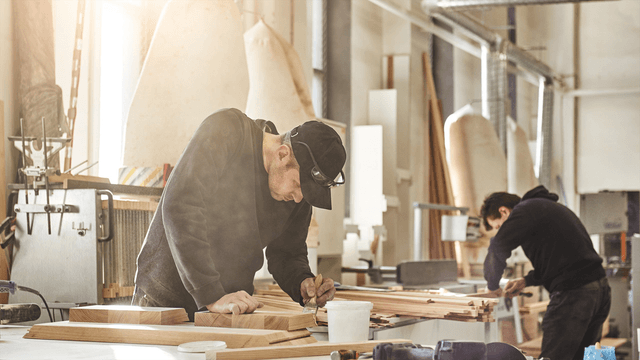 People working on woodwork